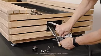 Plugging the ignitor wire and grounding wire into thesparker